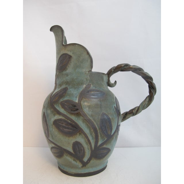 One-of-a-kind rustic style pitcher by master potter, Jane Woodside of Woodside pottery in Fairfax, California. She...