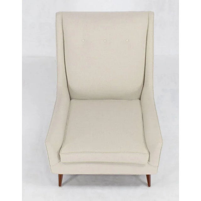 Mid-Century Modern dowel cone legs McCobb lounge chair. Has newly upholstered in linen like fabric.