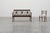 A refined Belgian Art Deco bench from around 1920, crafted in solid oak and shaped with the clean geometry and subtle...