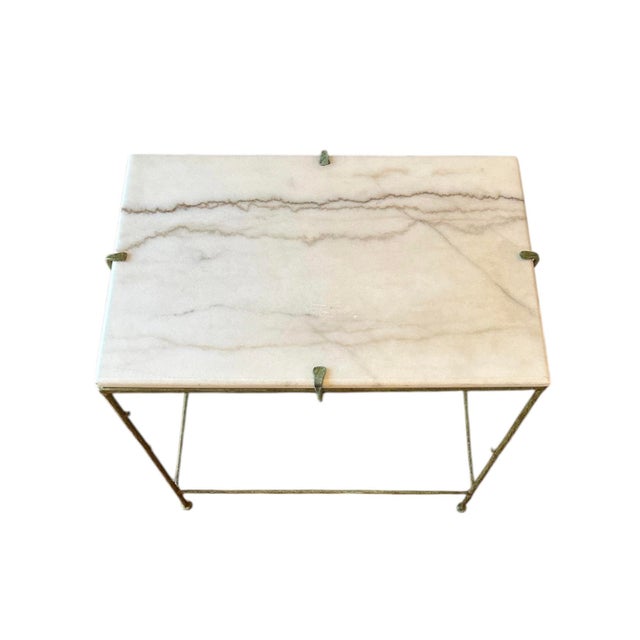 A stunning, vintage faux bois/twig accent table. Features a patinated cast metal faux bois/twig form table, accented with...