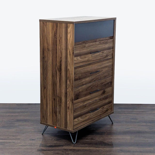 This stylish dresser features a natural walnut finish with a sleek gray accent on the top drawer. It includes five...