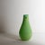 Beautiful, minimalist art glass flower pitcher, featuring a lime green exterior and a turquoise blue interior. Hand blown...