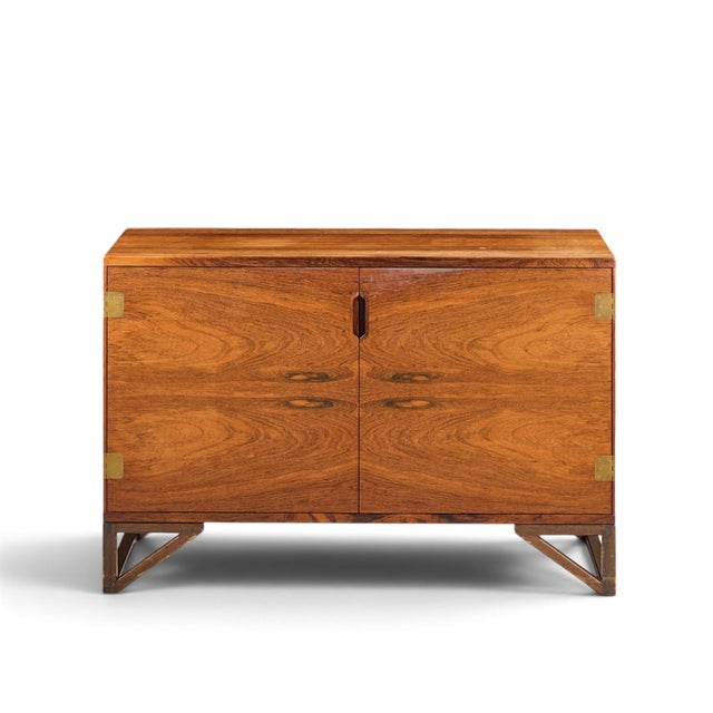 Svend Langkilde for Langkilde Møbler Mid Century Rosewood and Teak Cabinet This cabinet measures: 39.5 wide x 18.5 deep x...