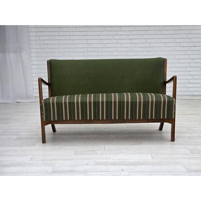 1960s, Danish 2-seater sofa. Original green furniture wool fabric, beech wood, springs in the seat. Original very good...