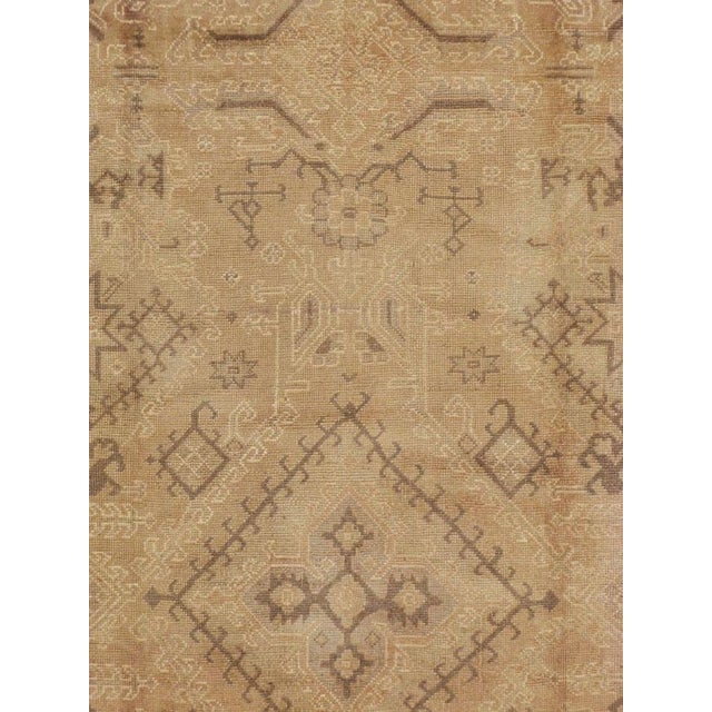An early second quarter of the 20th century Turkish Oushak carpet. Measures: 9' 10" x 11' 7"