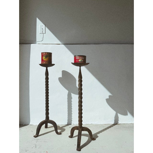 Heavy vintage twisted floor candle holders with tripod base. Beautiful accent to fireplace, corner, etc. brutalist....