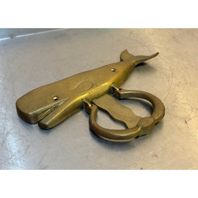 1960s-70s large brass whale door knocker. Excellent condition. Comes with screws.