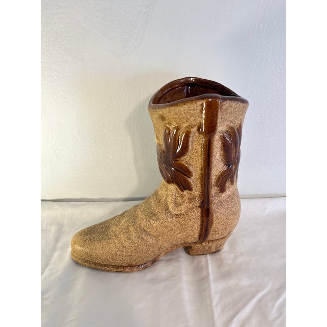 The only type of boot you can fill with flowers and give to yer darlin. Made in the 1970s and stamped by Haeger USA.