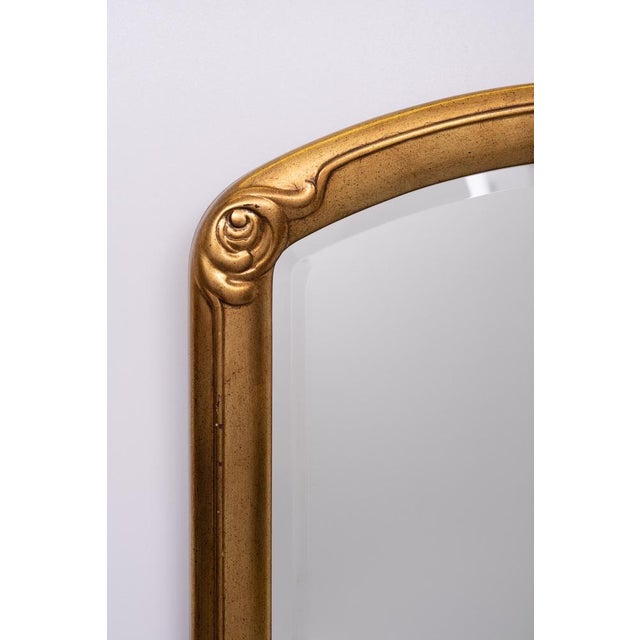 Very nice Art Deco style wall Mirror . Wooden Gold Color frame . comes with a beveled Mirror . Good quality mirror ....