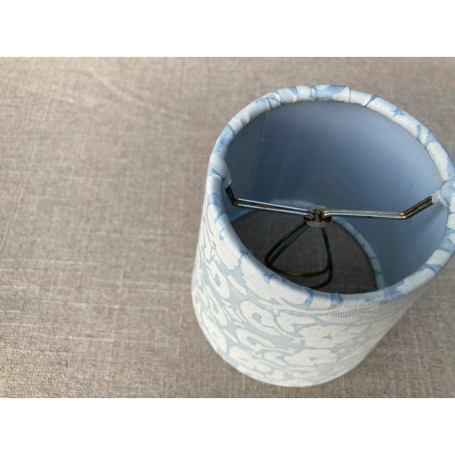 A clip top chandelier shade made with Fortuny’s iconic printed cotton