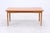 Vintage teak dining table with clean lines, rounded edges, and slender legs. The table can be extended on both sides,...