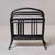 A bentwood magazine rack by Thonet, Vienna, circa 1900–1910. Steam-bent beechwood in an ebonized finish with...