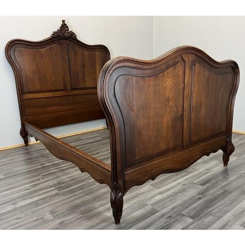 This elegant Antique French Louis single bed frame is a beautifully proportioned piece, showcasing classic curved lines,...