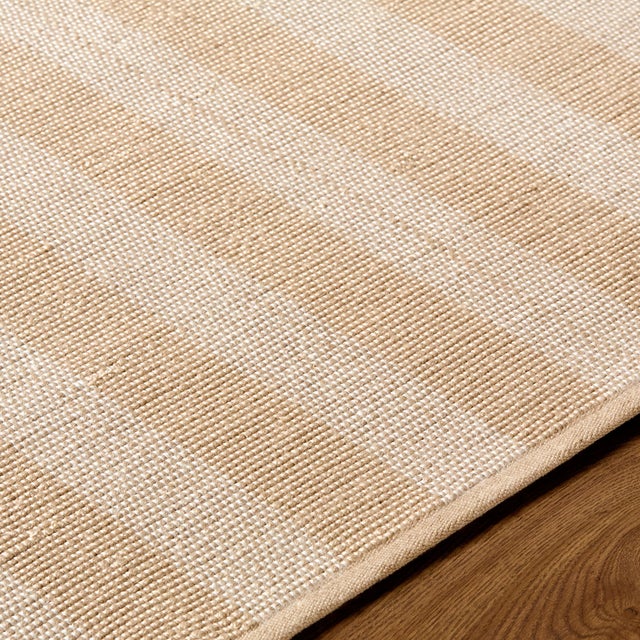 Transform your space into a serene coastal haven with the Harbor collection's exquisite handmade rug. Crafted with care in...