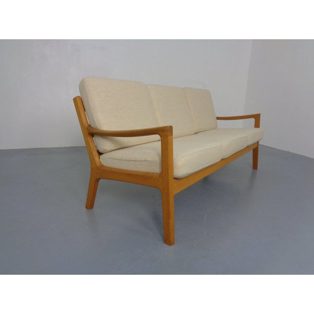 Ole Wanscher oak sofa from the 1960s. Original cushions with spring cores and zippers. The oak wood and cushions are in...