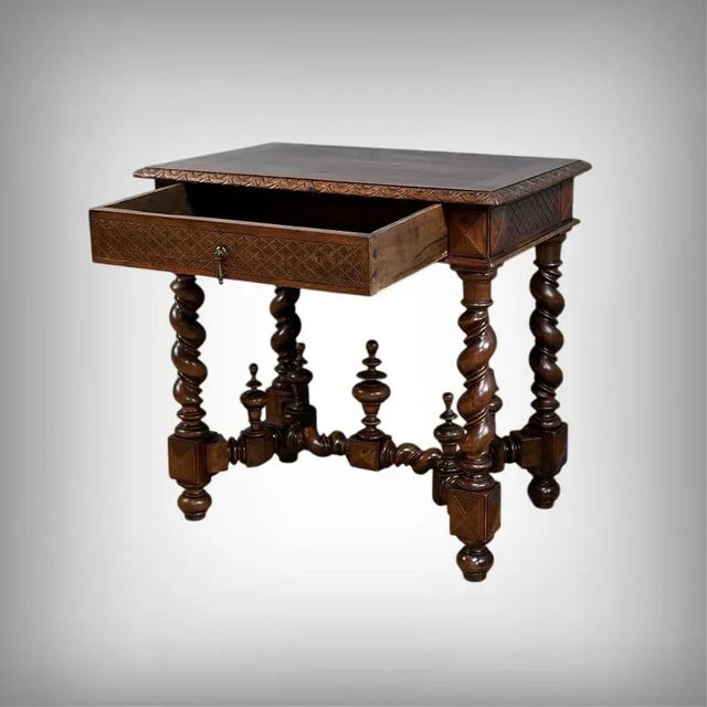 This small oak desk table, crafted in the Louis XIII style, dates from the mid-19th century. It seduces with its noble...