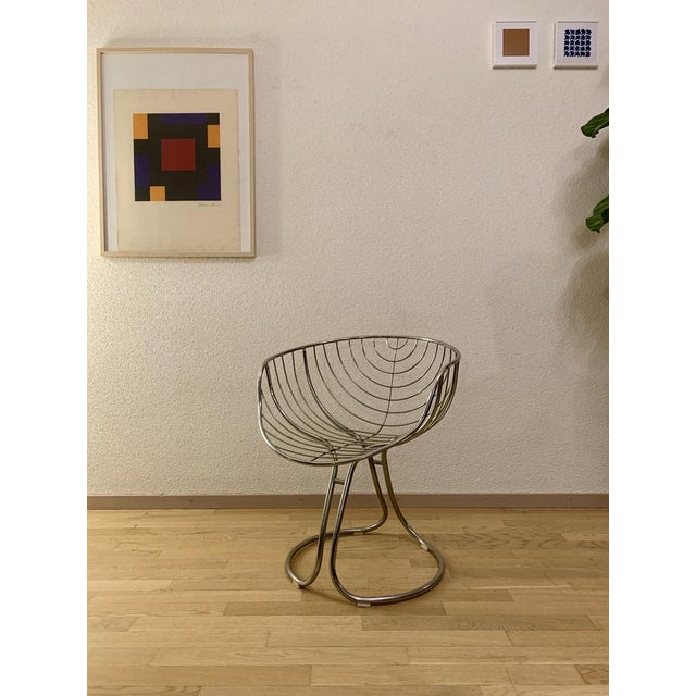 Very well preserved original with original wool cushion in the typical Space Age motif. I have official proof of...