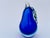Measuring nearly 8 inches tall, this oversized glass pear could function well as a bookend - but would look equally...