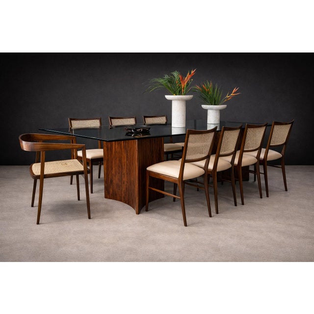 Designed in the 1950s, this pair of armchairs by Joaquim Tenreiro represents one of the most foundational and influential...