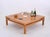 Gorgeous squared coffee table in oak wood and brass signed by Tommaso Barbi and produced in the 1970s in Italy. This...
