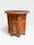 This item is a small hand-carved folding table from Hoshiarpur, India, created around 1950. The table features intricate...