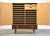 A mid century modern walnut armoire dresser with removable trays and brass hardware. Professionally refinished. 48” wide....