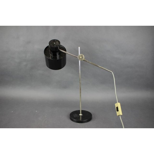 - Good original condition with Minimalist Mid-Century adjustable desk lamp manufactured in Czechoslovakia during the...