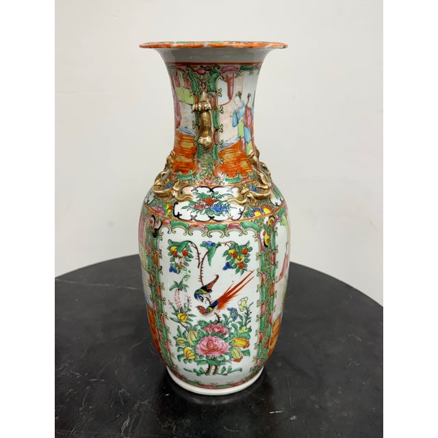 Design Plus Gallery presents a Vintage Rose Medallion Style Porcelain Vase with Gilt Foo Dog Handles. This tall porcelain...