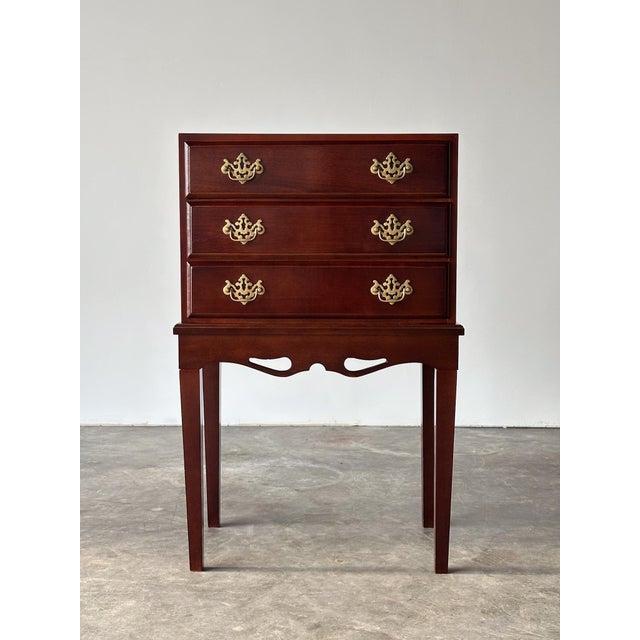 This little chest of drawers brings serious presence for its size. Three graduated, felt-lined drawers with pierced...