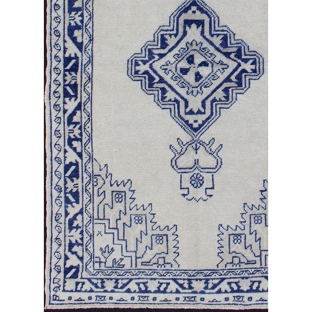 Tribal Vintage Turkish Oushak Rug Featuring Deep Indigo and Ivory Geometric Medallion For Sale - Image 3 of 12