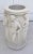 Here is an absolutely stunning umbrella stand that looks like it is carved from marble. The piece is actually a cast...