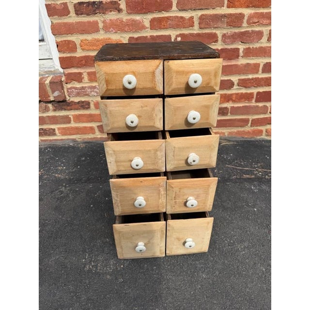 Antique Early American Premitive Style Pine Apothecary Cabinet or Spice Drawer Solid wood frame with white porcelain knobs...