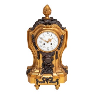 Louis XVI Style Gilt and Patinated Bronze Clock For Sale