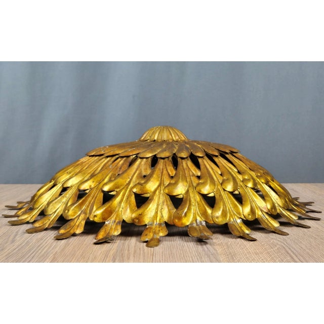 Healthy scale and impressive number of pieces in this vintage tole light shade. (for a ceiling light fixture or a form of...