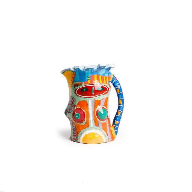 Ceramic jug hand painted with enamel created by Uruguay Artist Alfonso Reyes. At trobar we use it to serve our Sangria....