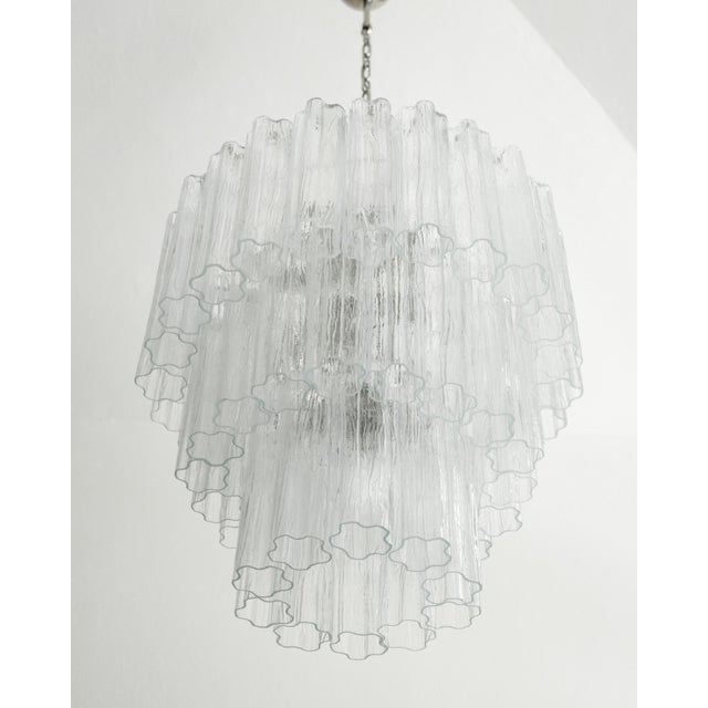 The chandelier has a new metal structure and wiring, on which petals made of Murano glass are hung. The petals are vintage...