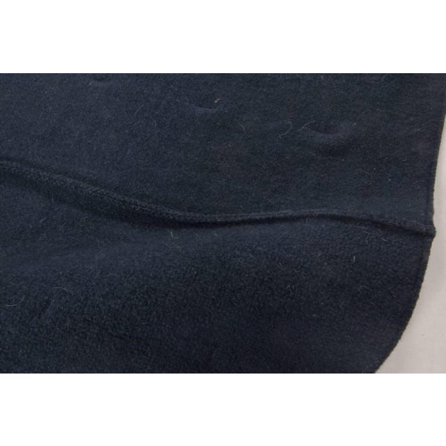 Contemporary Nunofelt black rug by Doris Leslie Blau Size: 7'5" × 8'2" (226 × 248 cm) This modern rug shows that...