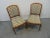 A pair of mid-century modern chairs by Brown Saltman, walnut frame with upholstered back and seats.