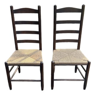 Set of 2 Vintage Dark Wood and Rush Seat Ladder Back Chairs For Sale