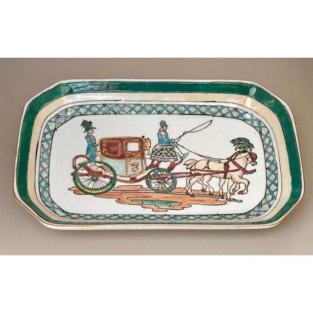 Toyo Japan porcelain tray featuring a hand-painted and embossed horse and carriage scene. The tray depicts a stately...