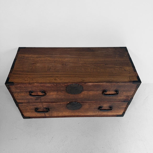 Atmospheric Japanese low tansu or chest of drawers cabinet from the Shōwa period, dating from around 1940–1950....