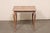 A French country square-shaped wooden table from the 18th century. This antique table from France has a square-shaped...