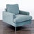 Add comfort and style to your space with this EQ3 lounge chair. It features a modern design, soft blue fabric, plush...