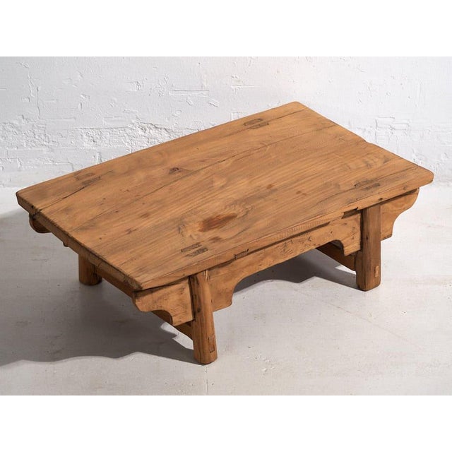 Antique Asian style coffee table (c.1870) Approximate age: 150 years Material: Elm wood Our antique coffee table is a...