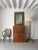 A large and impressive iron and wood wall mirror with a dual framing device. The solid wooden frames feature reeded...