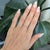 Delicate and timeless, this Pink Sapphire band ring is handcrafted in solid 14K gold for an elegant minimalist look....