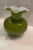 This is a lovely contemporary late vintage scalloped Olive Green Vase with a ruffled white flower top. It is absolutely...
