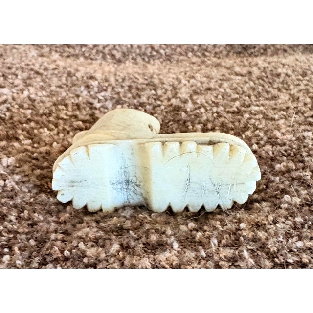 This hand-carved miniature (1.25” high X 2” long X .75” deep) man’s work boot is hand carved from either marble or...