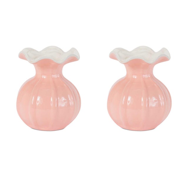Sweet, stylish, and full of charm, this set of Pink Ribbed Ruffle Rim Vases is the perfect way to brighten up your home...