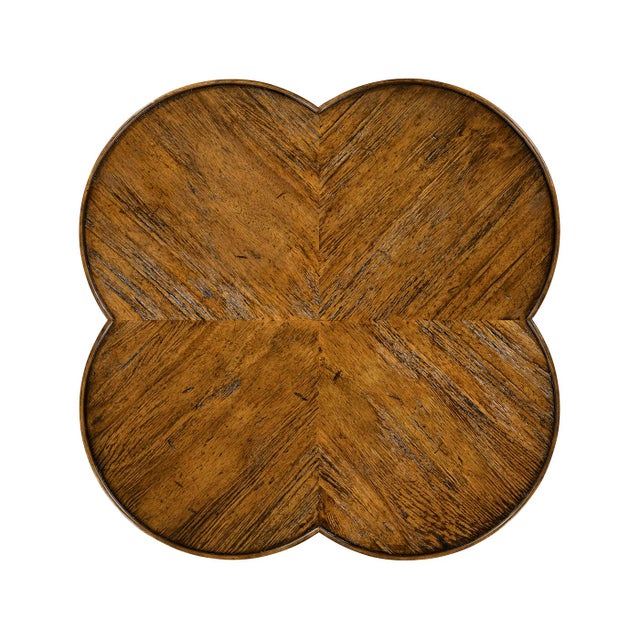 Designed with a timeless aesthetic, this table features a heavily distressed acacia wood construction that brings an air...